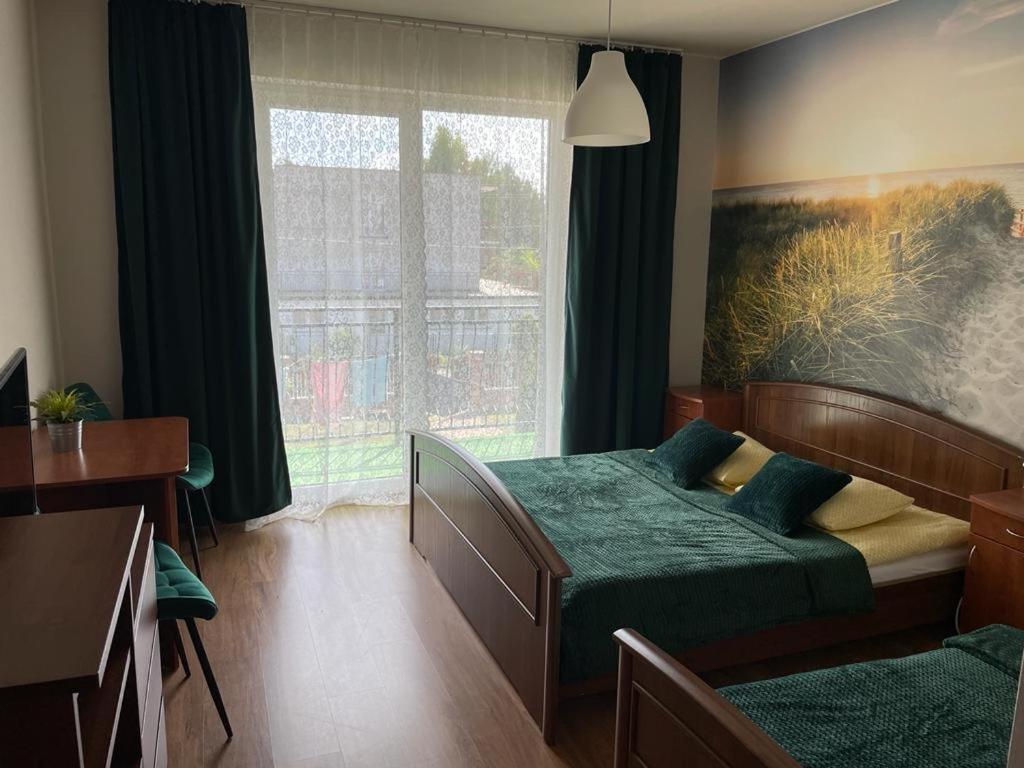 Emada- Pokoje Goscinne I Studia Ostrowo  Buitenkant foto